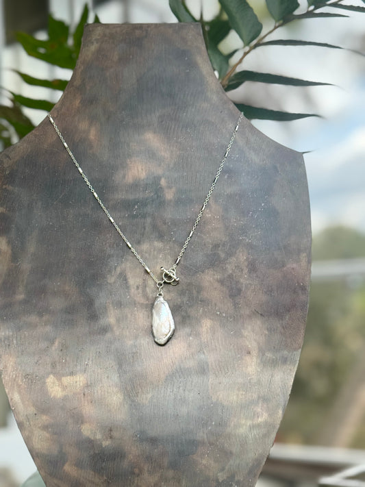 Stainless chain with solder calm shell pendant