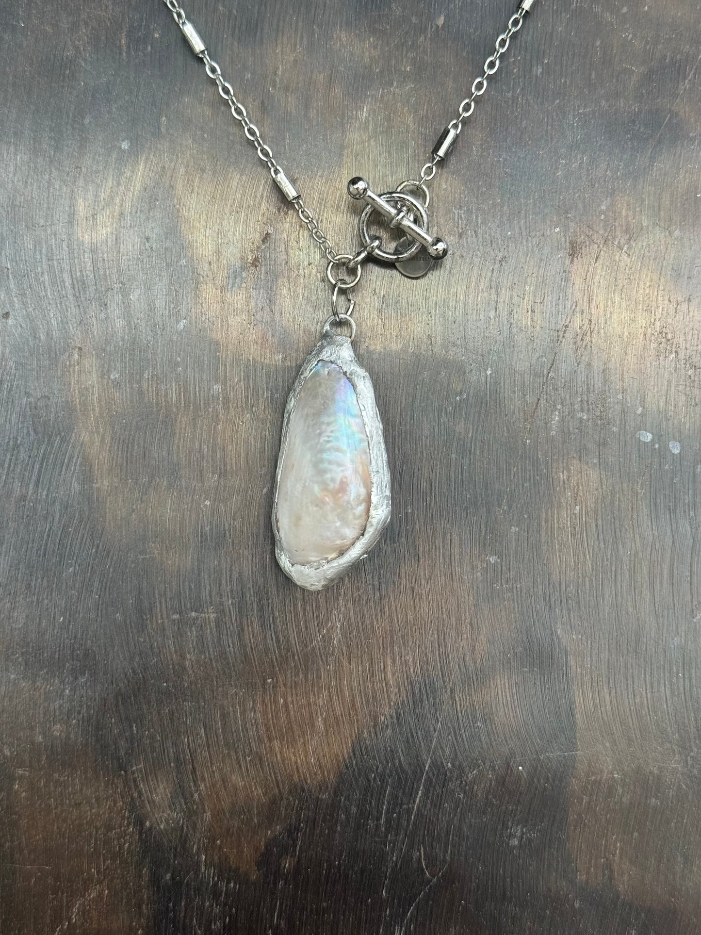 Stainless chain with solder calm shell pendant
