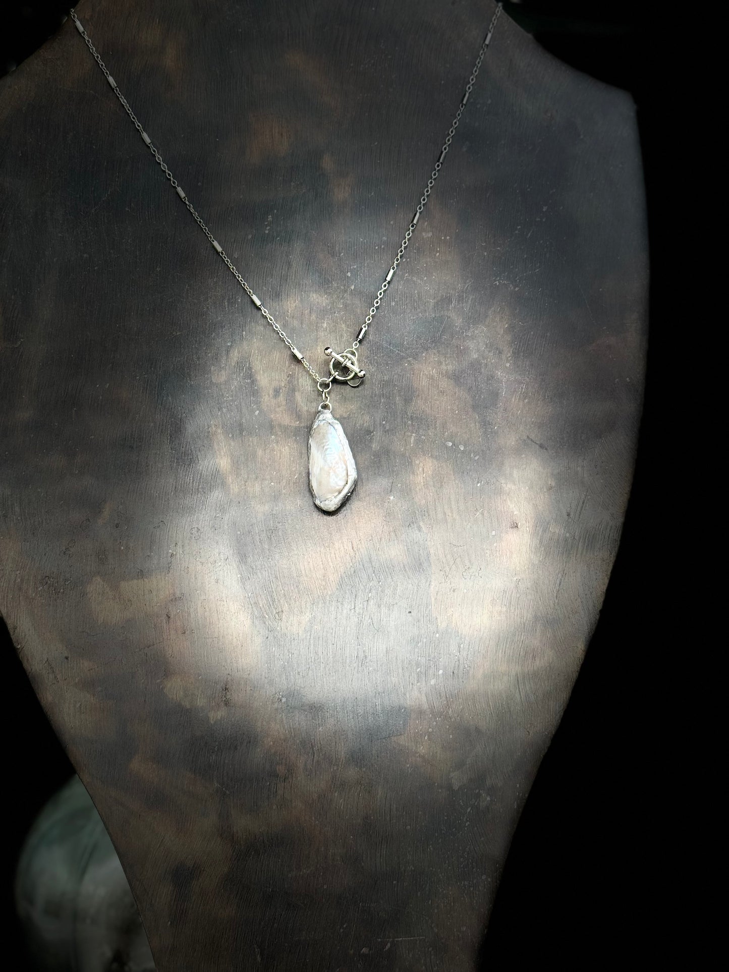 Stainless chain with solder calm shell pendant